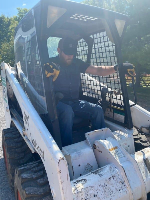 Site prep work with a skid steer